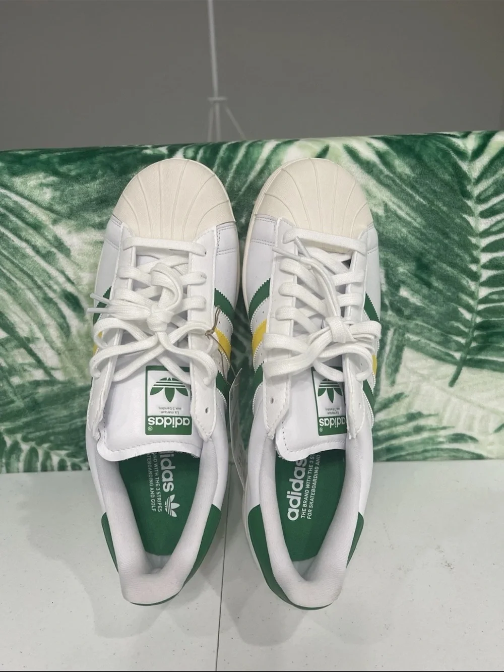 adidas superstar golf shoes White Sneakers with Green & Yellow Stripes
